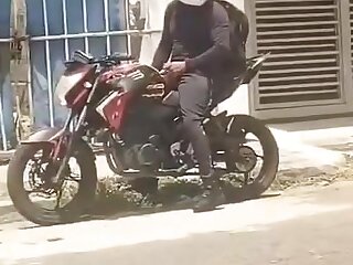 Biker jerks off on a street