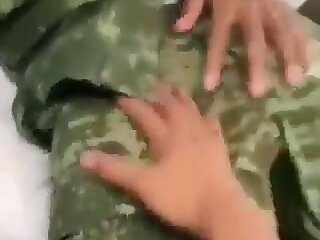 Army slut feels up a couple of bored and horny dudes