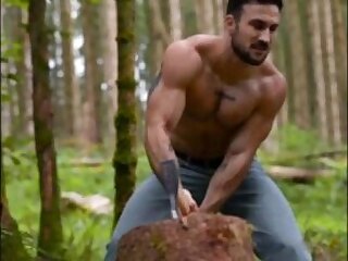 Lumberjack chopping wood and shooting cum
