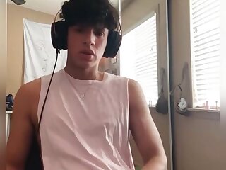 Hot Latino twink moans as he strokes his sexy cock and cums