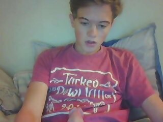Cute blonde teen jerks his dick on a webcam