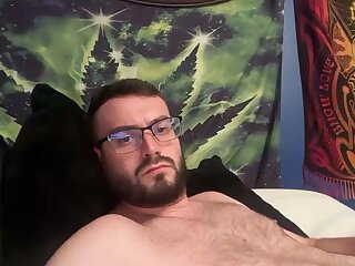 Cute white guy with a big cock jerks it off in his room