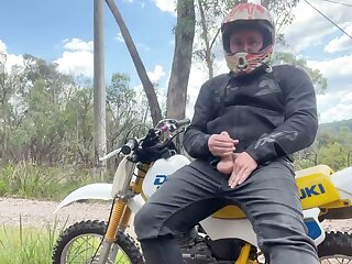 Dude blows load on side of road on his bike